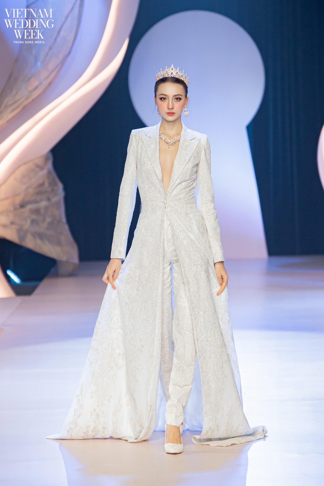 Full-body portrait of Vowtail on the runway at Vietnam Wedding Week 2025